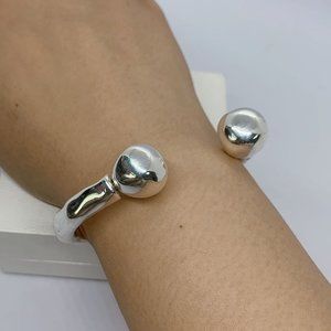 UNO DE 50 ZEN BRACELET Rigid silver plated bracelet with two balls